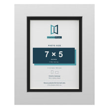 White 8 x 6 inch picture frame with a black mount for a 7 x 5 inch photo