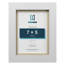 White 8 x 6 inch picture frame with an ivory mount for a 7 x 5 inch photo