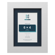 White 8 x 6 inch picture frame with a Pacific Blue mount for a 6 x 4 inch photo