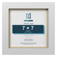 White 8 x 8 inch picture frame with an ivory mount for a 7 x 7 inch photo