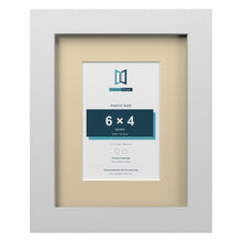 White 9 x 7 inch picture frame with an ivory mount for a 6 x 4 inch photo