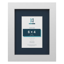 White 9 x 7 inch picture frame with a Pacific Blue mount for a 6 x 4 inch photo