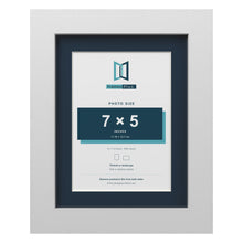 White 9 x 7 inch picture frame with a Pacific Blue mount for a 7 x 5 inch photo