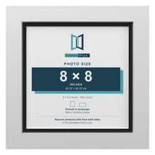White 9 x 9 inch picture frame with a black mount for an 8 x 8 inch photo