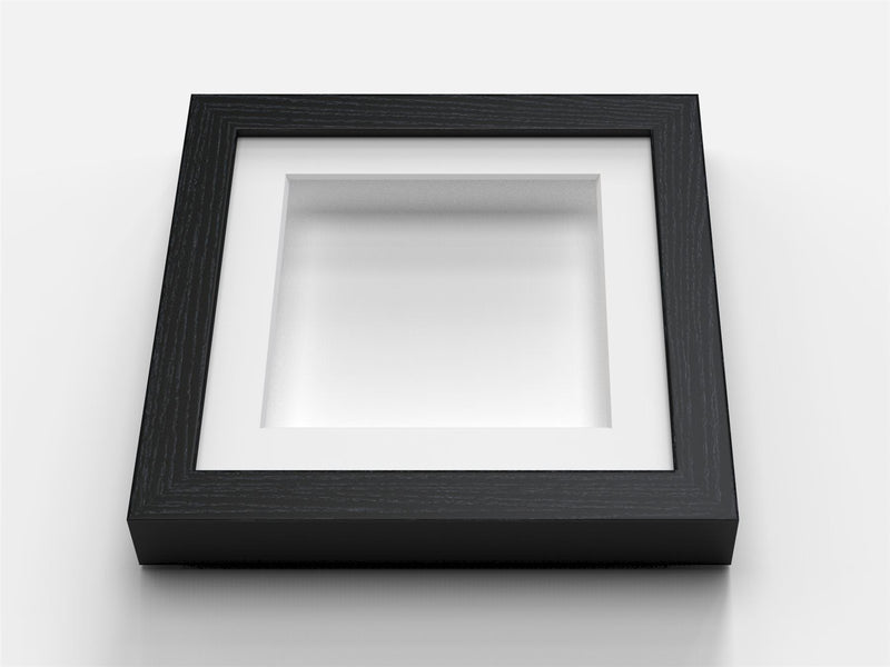 Black 25mm display frame for memorabilia with white mount and 35mm deep box design.